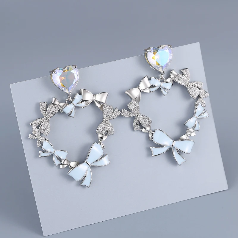 925 silver auroras color heart-shaped blue bowknot earrings for women new in high-end stud earings Light luxury wedding jewelry
925 silver auroras color heart-shaped blue bowknot earrings for women new in high-end stud earings Light luxury wedding jewelry