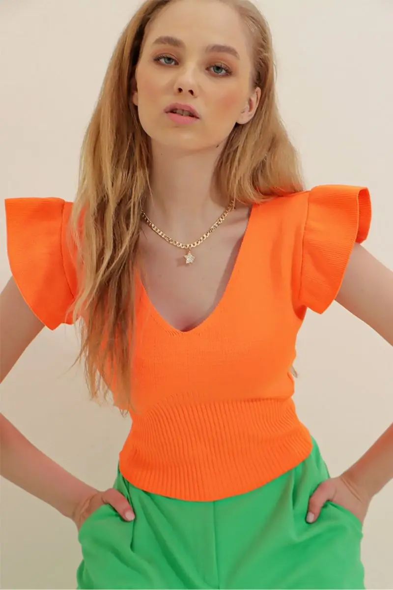 Женская трикотажная блузка, оранжевая трикотажная блузка с V-образным вырезом
Женская трикотажная блузка, оранжевая трикотажная блузка с V-образным вырезом