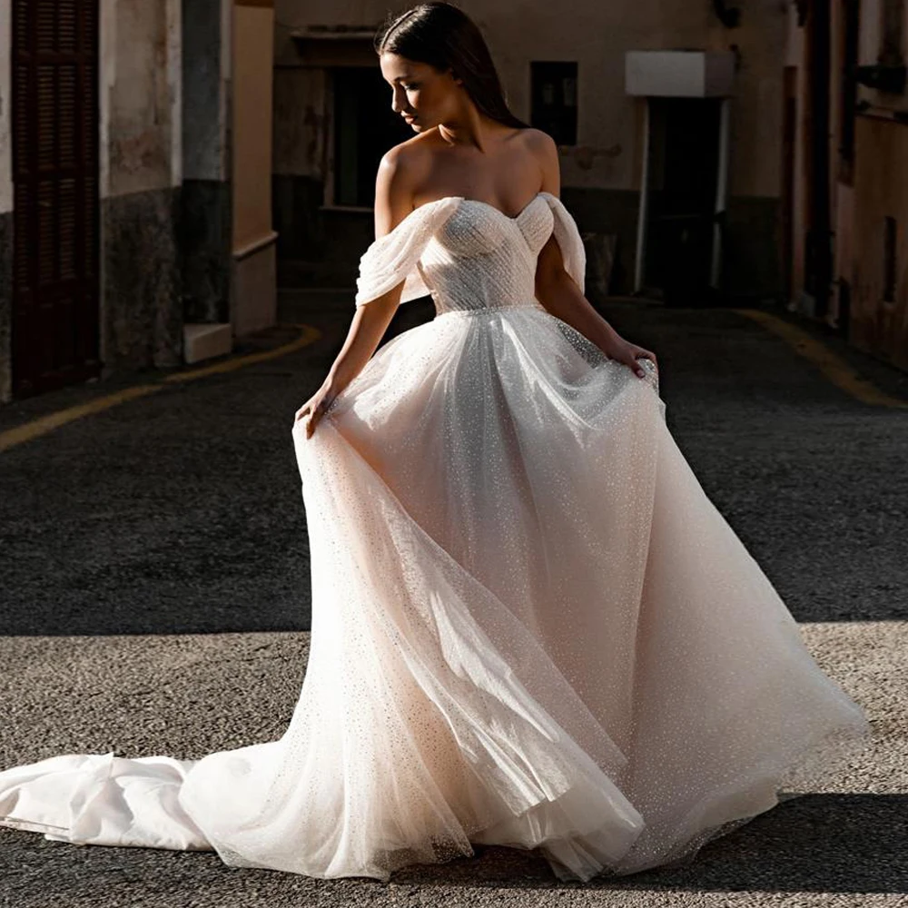 Charming Boho Glitter Wedding Dresses Off the Shoulder Pleated Sweetheart A Line Sweep Train Bridal Gowns Custom Made 2023
Charming Boho Glitter Wedding Dresses Off the Shoulder Pleated Sweetheart A Line Sweep Train Bridal Gowns Custom Made 2023