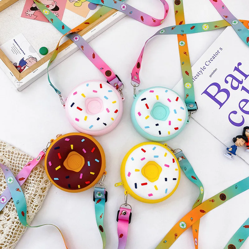 2022 New Children's Mini Donut Silicone Shoulder Bag Cute Cartoon Coin Purse Girls
2022 New Children's Mini Donut Silicone Shoulder Bag Cute Cartoon Coin Purse Girls