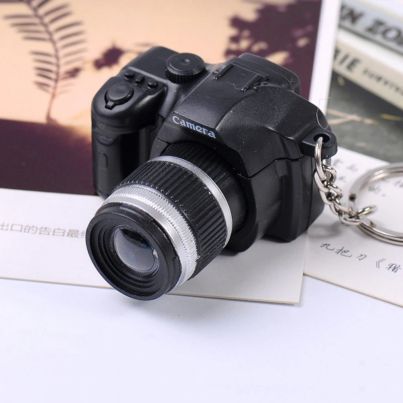 Mini Digital Reflex DSLR Camera Camera LED Flash Light Torch Shutter Sound Keychain Girls Bag Pendant Car Decor Key Ring Gift
Mini Digital Reflex DSLR Camera Camera LED Flash Light Torch Shutter Sound Keychain Girls Bag Pendant Car Decor Key Ring Gift