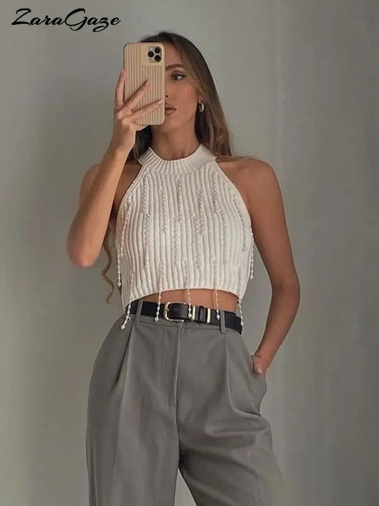 Elegant Pearl Beading Sweater Pullover Women Halter Tassel Tshirt Cropped Sleeveless Solid Sexy Tops Knitted O-Neck Strecth Vest
Elegant Pearl Beading Sweater Pullover Women Halter Tassel Tshirt Cropped Sleeveless Solid Sexy Tops Knitted O-Neck Strecth Vest