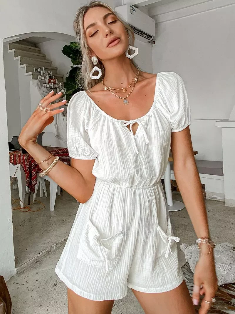 Causal pocket v-neck elastic waist romper Off shoulder button white jumpsuit romper Summer fashion holiday rompers 2021
Causal pocket v-neck elastic waist romper Off shoulder button white jumpsuit romper Summer fashion holiday rompers 2021