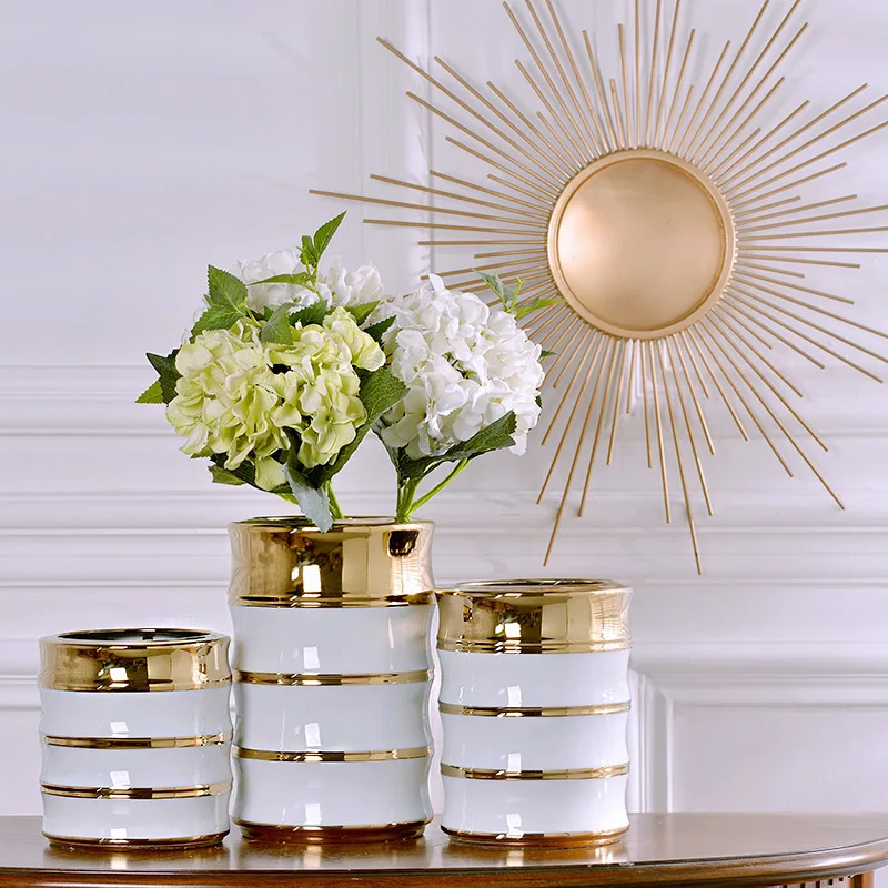 ceramic Modern simple Chinese white gilt flower vase home living dining room decoration
ceramic Modern simple Chinese white gilt flower vase home living dining room decoration