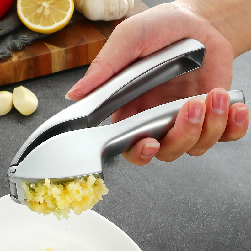 Garlic Press Crusher Mincer with Sturdy Construction Professional Food Grade Rust proof Easy Squeeze and Clean
Garlic Press Crusher Mincer with Sturdy Construction Professional Food Grade Rust proof Easy Squeeze and Clean