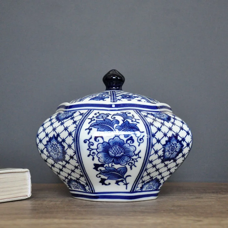 and Blue white porcelain with octagonal canister blue background Jingdezhen ceramic storage tank decorative tea pots snack ca 
and Blue white porcelain with octagonal canister blue background Jingdezhen ceramic storage tank decorative tea pots snack ca