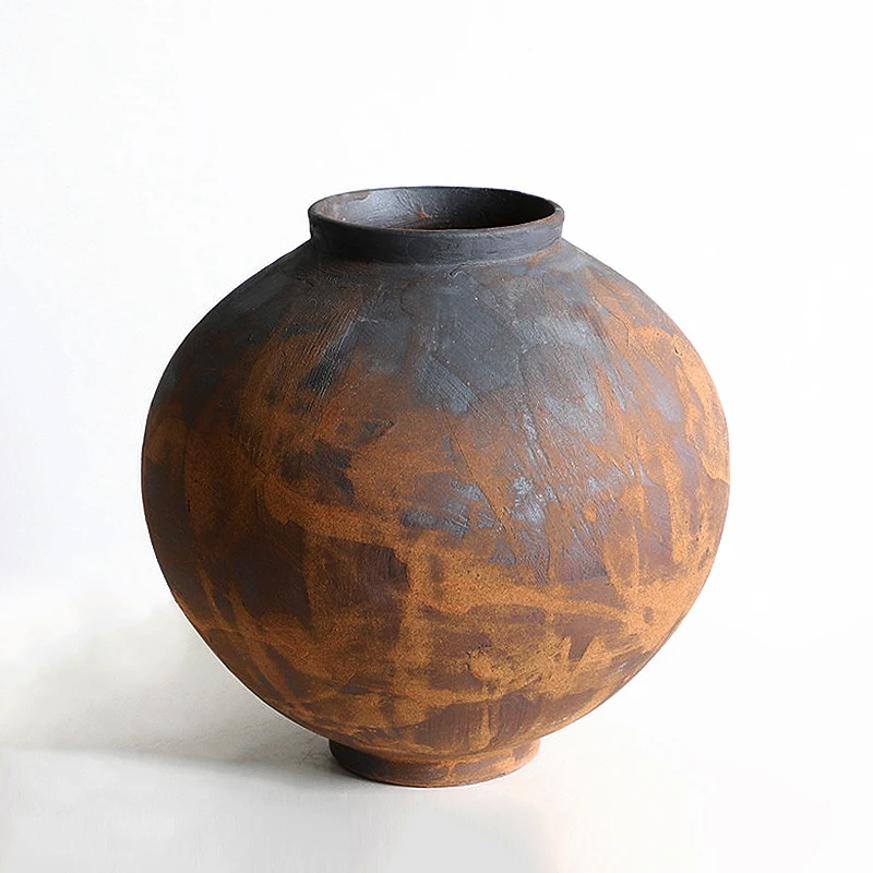 Retro, nostalgic, minimalist, modern, and tranquil style brown rough pottery jars, flower ware, and decorative decorations
Retro, nostalgic, minimalist, modern, and tranquil style brown rough pottery jars, flower ware, and decorative decorations