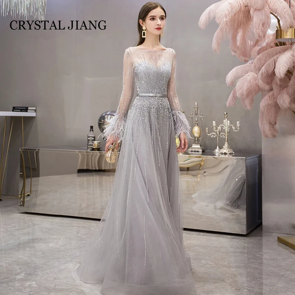 Luxury Sexy Long Dubai Evening Dresses O Neck Beaded Tulle Full Sleeves with Feathers A Line Sweep Train Prom Gowns
Luxury Sexy Long Dubai Evening Dresses O Neck Beaded Tulle Full Sleeves with Feathers A Line Sweep Train Prom Gowns