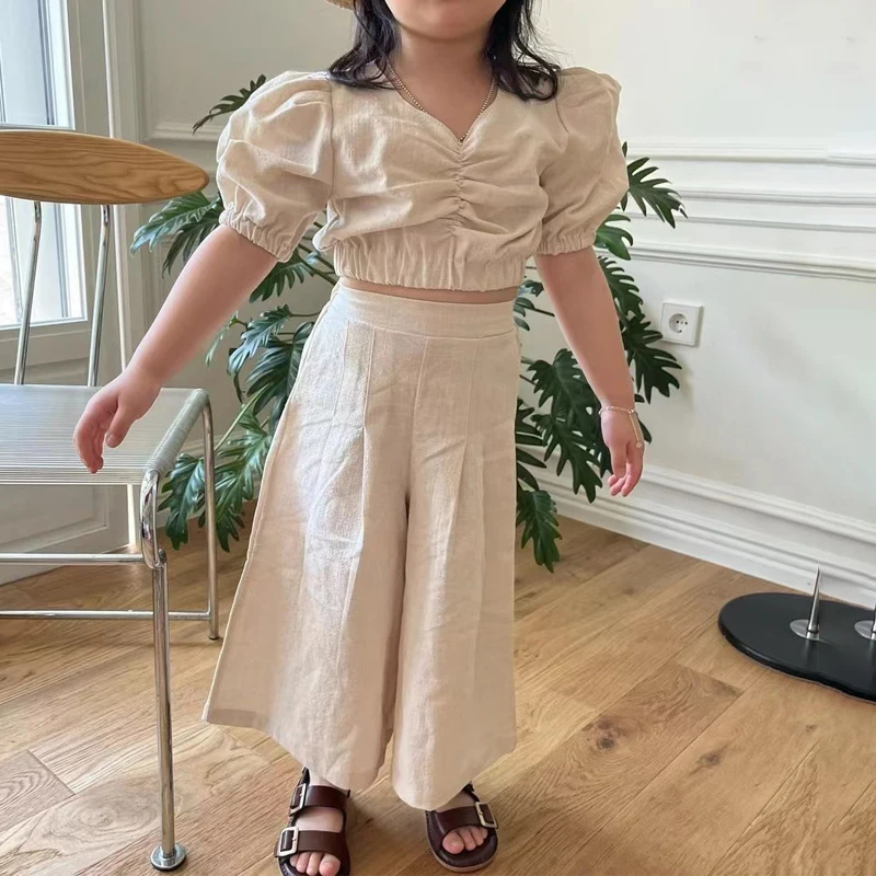 Летний комплект для девочек из 2 предметов, блузка для малышей + широкие штаны, Детский костюм, Детская уличная одежда, детский модный короткий топ из хлопчатобумажной ткани
Летний комплект для девочек из 2 предметов, блузка для малышей + широкие штаны, Детский костюм, Детская уличная одежда, детский модный короткий топ из хлопчатобумажной ткани