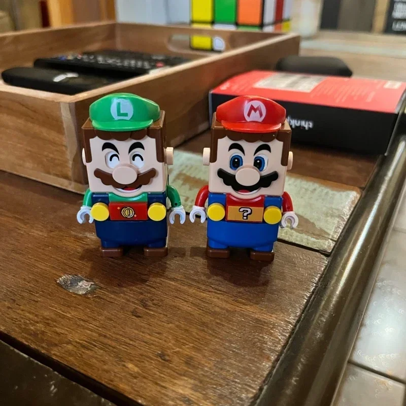 2023 Новые блоки в стиле Super Mario Bros, миниатюрные блоки Луиджи булидинга, экшн-фигурки, сборные игрушки, куклы, детские подарки на день рождения
2023 Новые блоки в стиле Super Mario Bros, миниатюрные блоки Луиджи булидинга, экшн-фигурки, сборные игрушки, куклы, детские подарки на день рождения