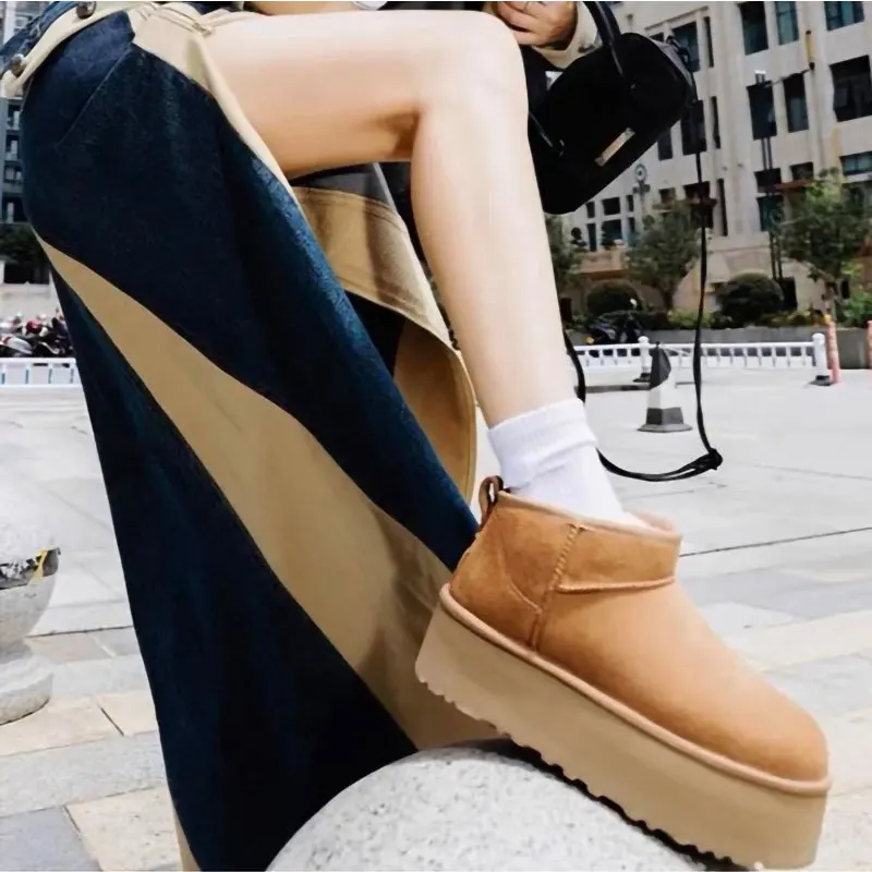 Fur integrated snow boots women's winter thick-soled shoes warm cotton shoes solid color fur boots round toe short boots
Fur integrated snow boots women's winter thick-soled shoes warm cotton shoes solid color fur boots round toe short boots