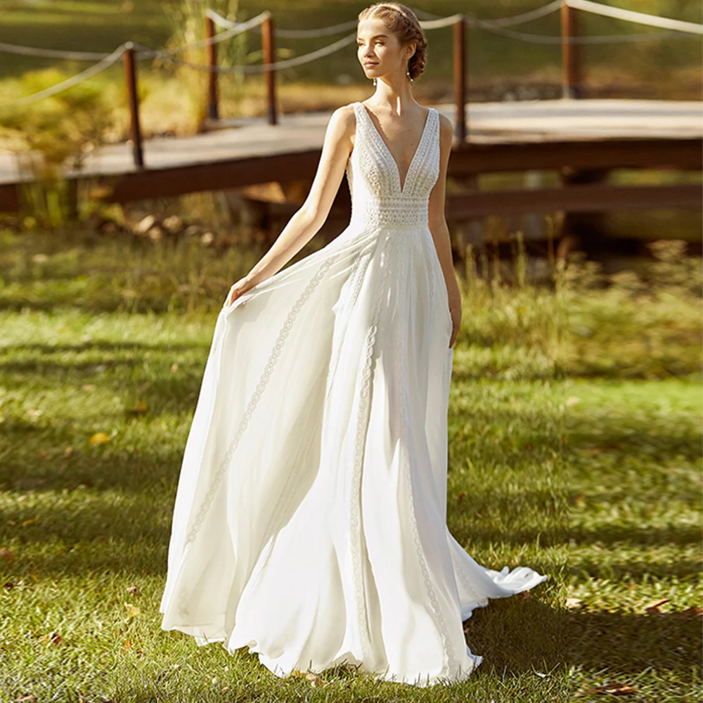 Ramanda Simple V-Neck Sleeveless Chiffon A-Line Bridal Gown For Women Sexy Backless Pattern Vestido De Novia 2023 Custom Made
Ramanda Simple V-Neck Sleeveless Chiffon A-Line Bridal Gown For Women Sexy Backless Pattern Vestido De Novia 2023 Custom Made