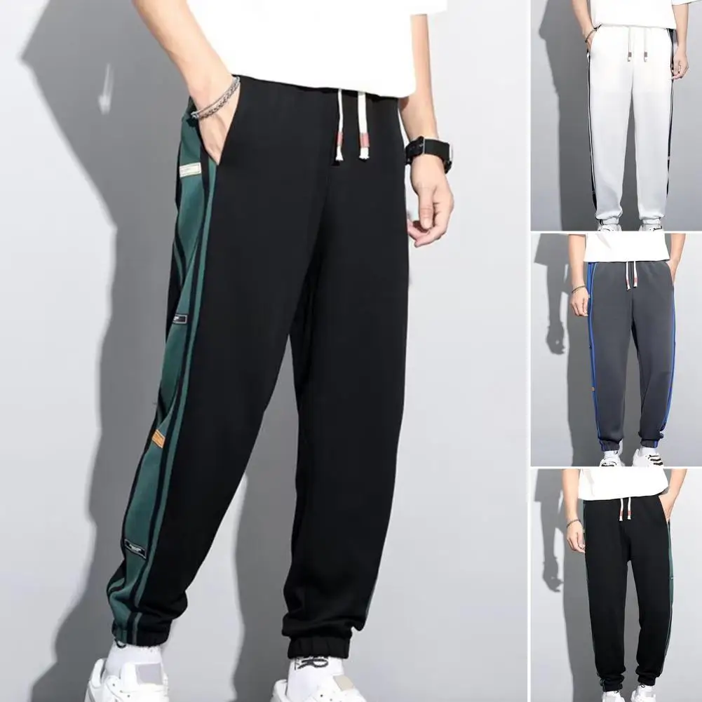 Men Autumn Pants Color Block Elastic Waist Drawstring Pockets Ankle Tied Loose Sports Trousers Sweatpants Streetwear
Men Autumn Pants Color Block Elastic Waist Drawstring Pockets Ankle Tied Loose Sports Trousers Sweatpants Streetwear