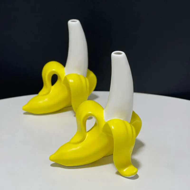 Handmade art ceramic banana vase living room bedroom table top dried flower arranger creative fruit decoration ornaments
Handmade art ceramic banana vase living room bedroom table top dried flower arranger creative fruit decoration ornaments