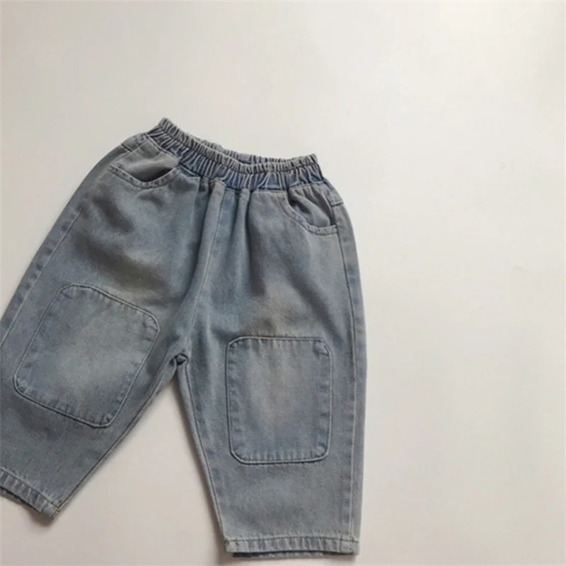 Spring and autumn new radish pants boys and girls fashionable washed and worn out personality patch denim trousers
Spring and autumn new radish pants boys and girls fashionable washed and worn out personality patch denim trousers