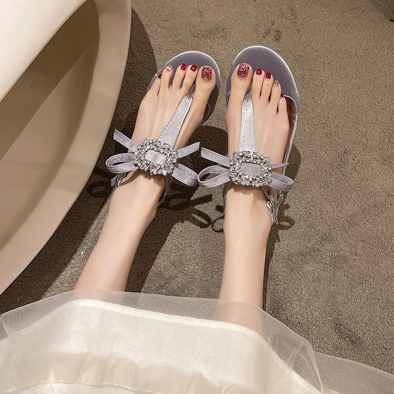 Sandals Women's Summer One Word Belt 2022 New Rhinestone Fairy Wind Casual Flip-flops Women's Sandals Flat Bow Women's Shoes
Sandals Women's Summer One Word Belt 2022 New Rhinestone Fairy Wind Casual Flip-flops Women's Sandals Flat Bow Women's Shoes