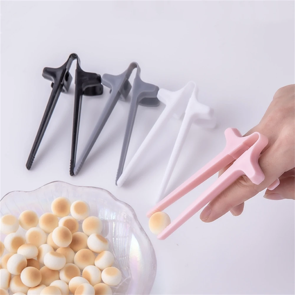 Children's Finger Chopsticks Lazy Clip Game Player Snack Not Dirty Hand Learning Chopsticks Dining Kitchen Bar Cutlery Tableware
Children's Finger Chopsticks Lazy Clip Game Player Snack Not Dirty Hand Learning Chopsticks Dining Kitchen Bar Cutlery Tableware