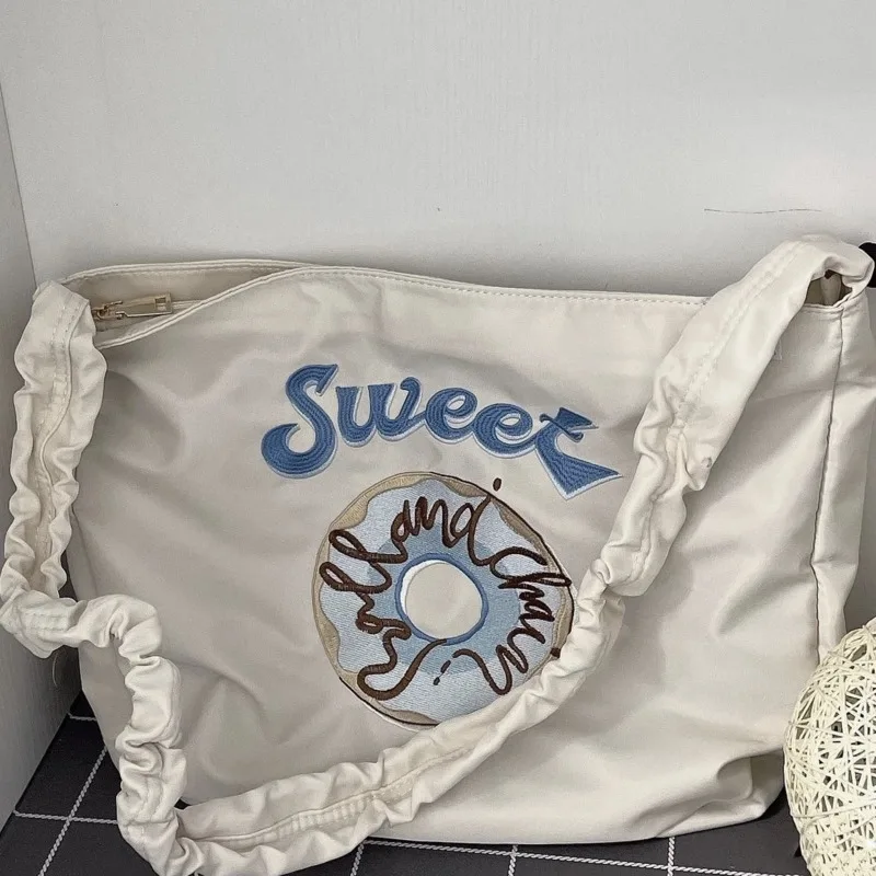 Niche Tote Bag Donuts Nylon Shoulder Bag Large Capacity Leisure Underarm Bag Messenger Bag
Niche Tote Bag Donuts Nylon Shoulder Bag Large Capacity Leisure Underarm Bag Messenger Bag