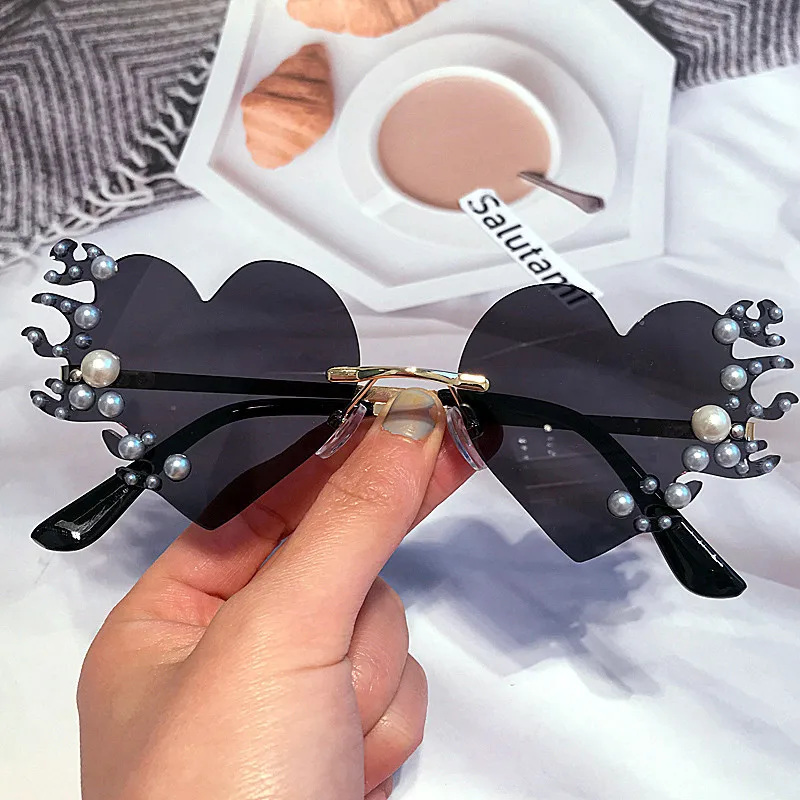 Unique Rimless Heart Shape White Pearl Sunglasses For Women New Luxury Brand DIY Flame Party Sun Glasses Female Elegant Eyewear
Unique Rimless Heart Shape White Pearl Sunglasses For Women New Luxury Brand DIY Flame Party Sun Glasses Female Elegant Eyewear