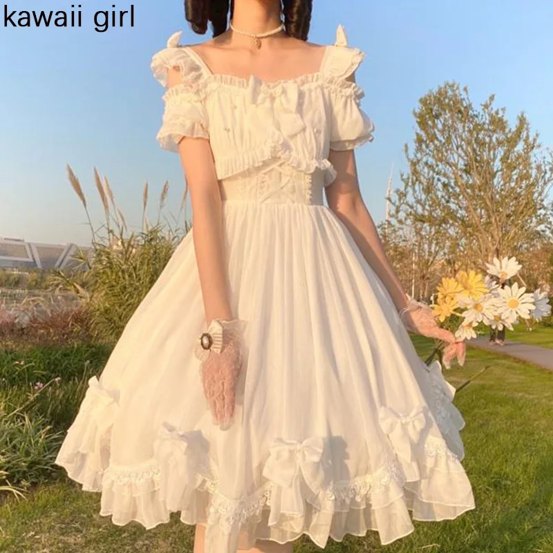 Kawaii Girl Lolita Retro Cute Bow Dress Sexy Backless Slim JSK Fairy Dresses Women High Quality Black White Elegant Ladies Dress
Kawaii Girl Lolita Retro Cute Bow Dress Sexy Backless Slim JSK Fairy Dresses Women High Quality Black White Elegant Ladies Dress