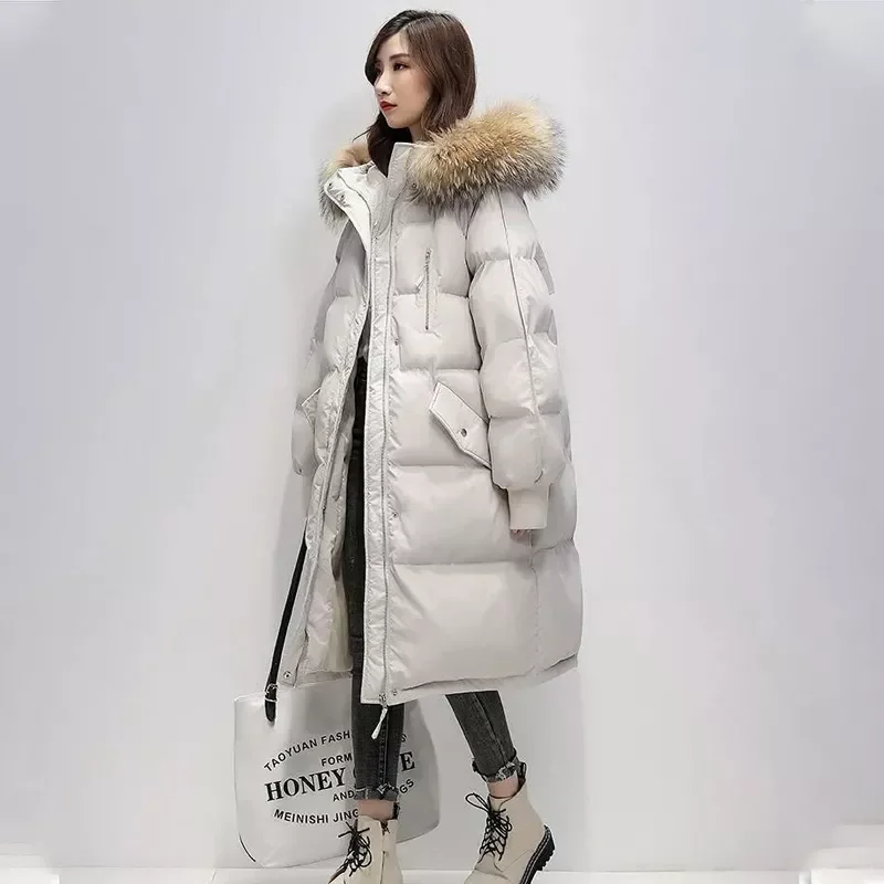 Women's Winter Long Down Cotton Jacket Korean Stye Large Fur Collar Hooded Thick Parkas Warm Loose Clothing Women Coat 2021
Women's Winter Long Down Cotton Jacket Korean Stye Large Fur Collar Hooded Thick Parkas Warm Loose Clothing Women Coat 2021