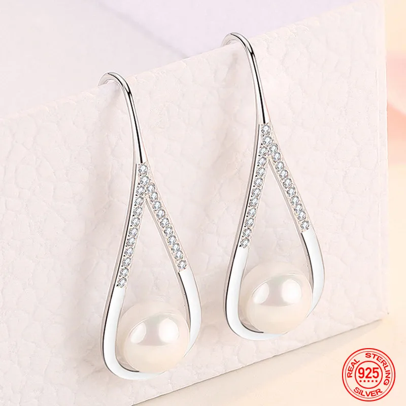 925 Sterling Silver Drop Shaped Pearl Zircon Dangle Earring For Women Charm Engagement Jewelry Party Gift
925 Sterling Silver Drop Shaped Pearl Zircon Dangle Earring For Women Charm Engagement Jewelry Party Gift