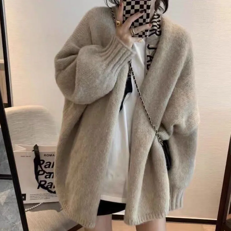 Gentle wind soft waxy lazy Sweater Coat female loose top Hong Kong style retro simple solid color knitted cardigan shawl Clothes
Gentle wind soft waxy lazy Sweater Coat female loose top Hong Kong style retro simple solid color knitted cardigan shawl Clothes
