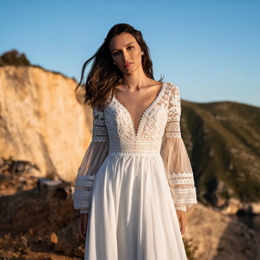 Bohemian Wedding Gowns 2022 Long Sleeves V-Neck Backless Bridal Dresses A-Line Lace Appliques Beach Chiffon Vestido De Noiva
Bohemian Wedding Gowns 2022 Long Sleeves V-Neck Backless Bridal Dresses A-Line Lace Appliques Beach Chiffon Vestido De Noiva