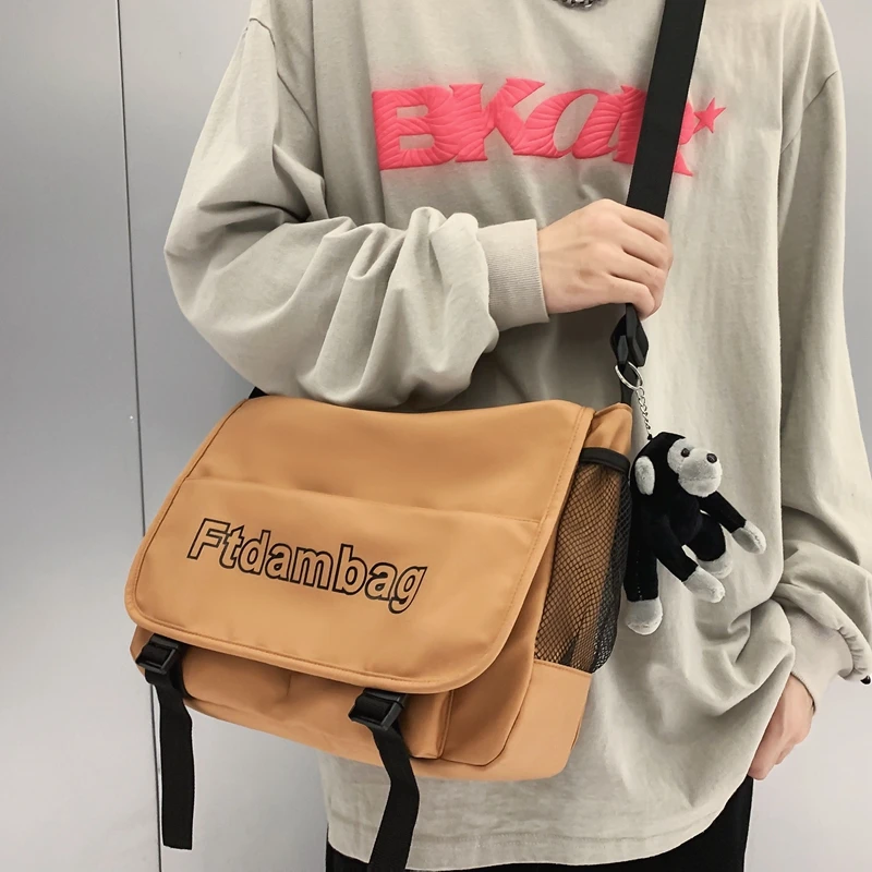 Korean Fashion Letter Women Bag Cute Pendant Crossbody Female Shoulder Bags Solid Color Boys Girls College Student Messenger Bag
Korean Fashion Letter Women Bag Cute Pendant Crossbody Female Shoulder Bags Solid Color Boys Girls College Student Messenger Bag