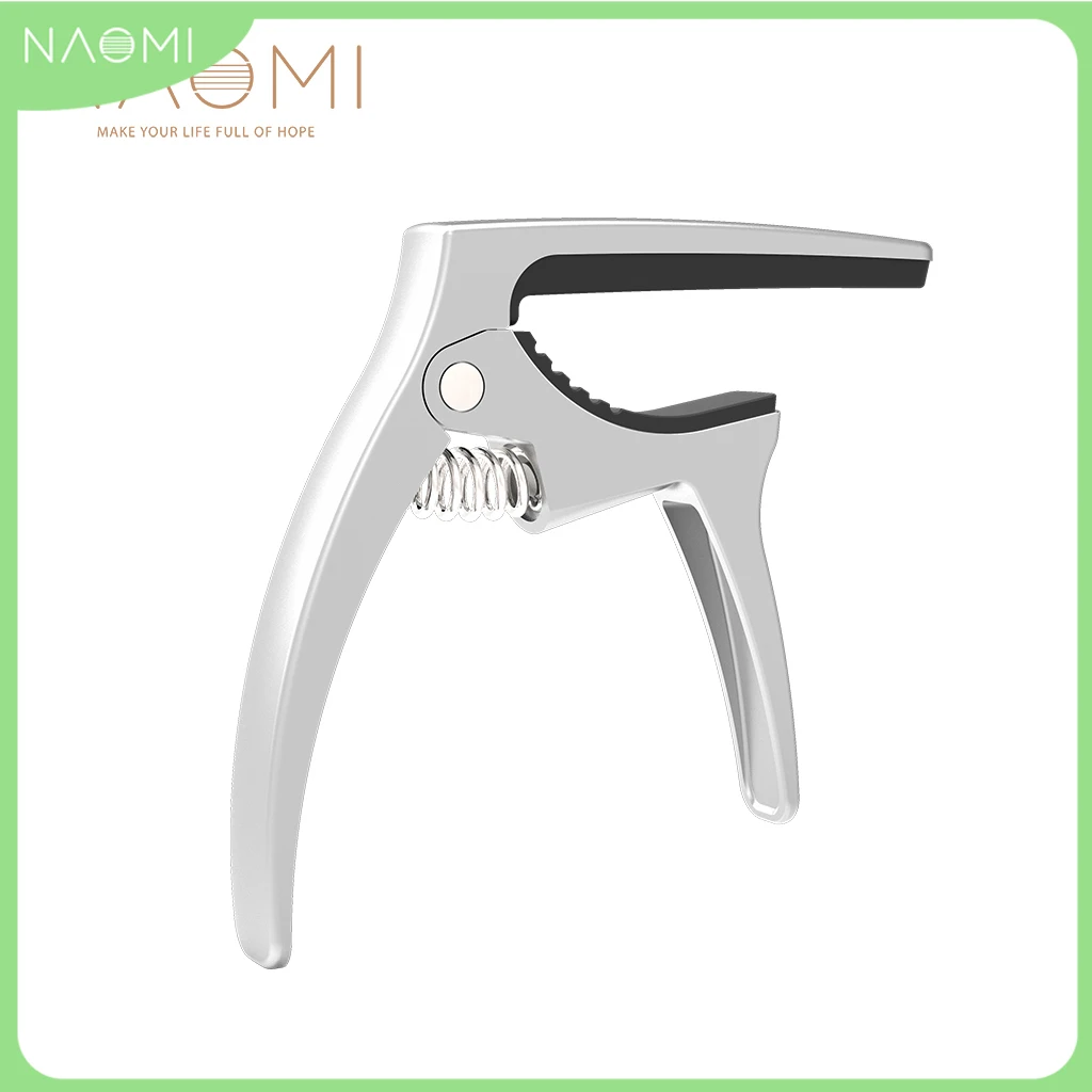 NAOMI Professional Ukulele Capo Single-Handed Quick Change Ukelele Capo 4 Strings Hawaii Guitar Capos Guitar Parts & Accessories
NAOMI Professional Ukulele Capo Single-Handed Quick Change Ukelele Capo 4 Strings Hawaii Guitar Capos Guitar Parts & Accessories