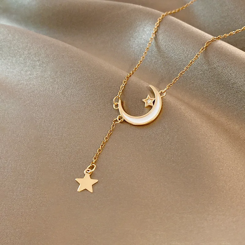 South Korea East gate simple titanium steel necklace female trend personality star moon zircon clavicle chain cold ethos pendant
South Korea East gate simple titanium steel necklace female trend personality star moon zircon clavicle chain cold ethos pendant