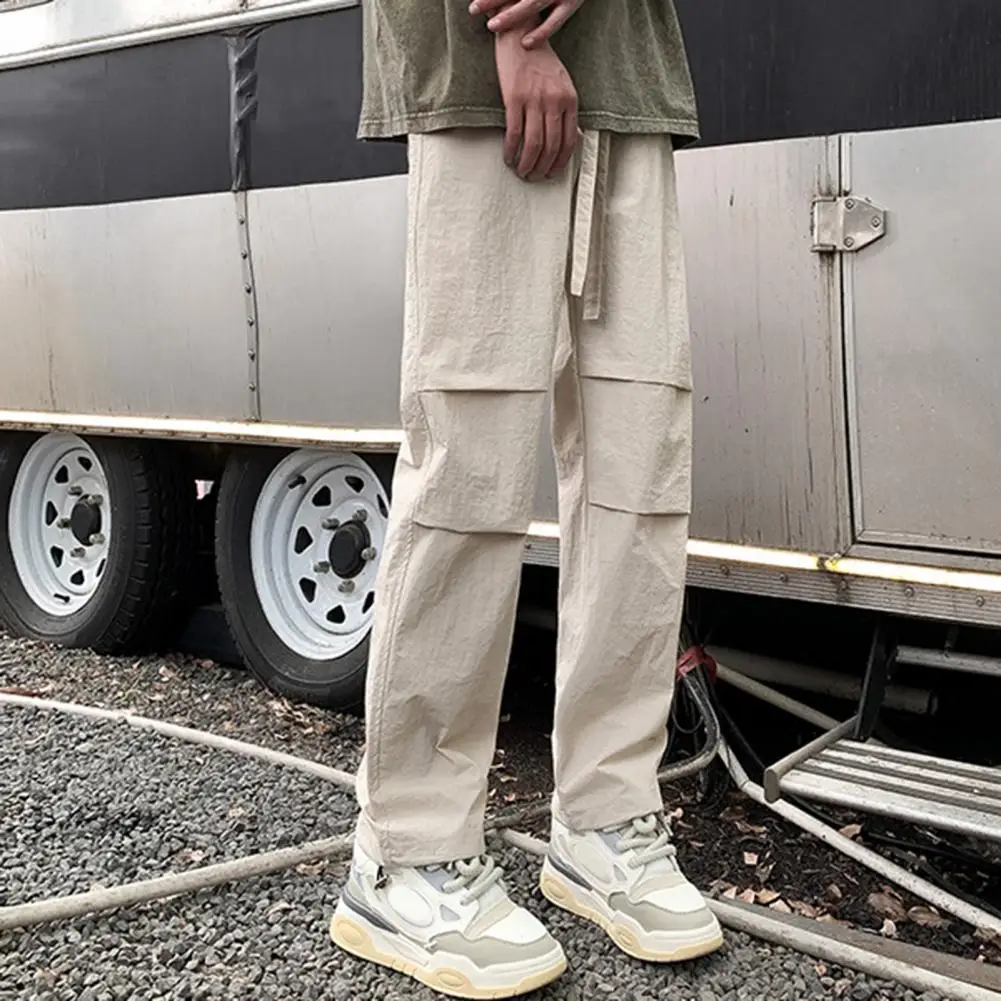 Solid Color Cargo Pants Quick Drying Men's Cargo Pants Wide Leg Streetwear with Elastic Waistband Drawstring Pockets for Casual
Solid Color Cargo Pants Quick Drying Men's Cargo Pants Wide Leg Streetwear with Elastic Waistband Drawstring Pockets for Casual
