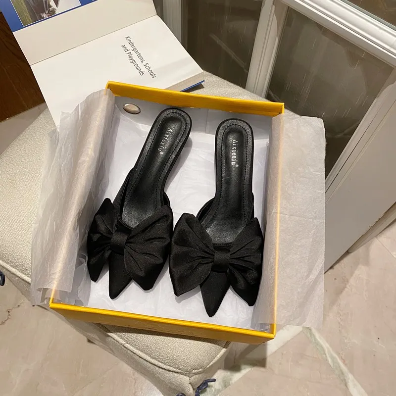 2021 spring net red pointed toe stiletto high heels bow without heels lazy half drag cat with Muller slippers women
2021 spring net red pointed toe stiletto high heels bow without heels lazy half drag cat with Muller slippers women