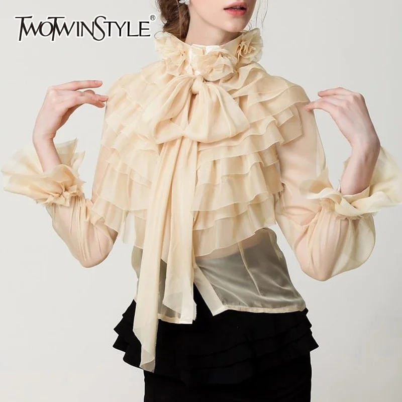 

TWOTWINSTYLE Perspective Tops Female Bowknot Flare Long Sleeve Ruffle Shirt Blouse Women Korean Fashion Clothes 2020 Spring