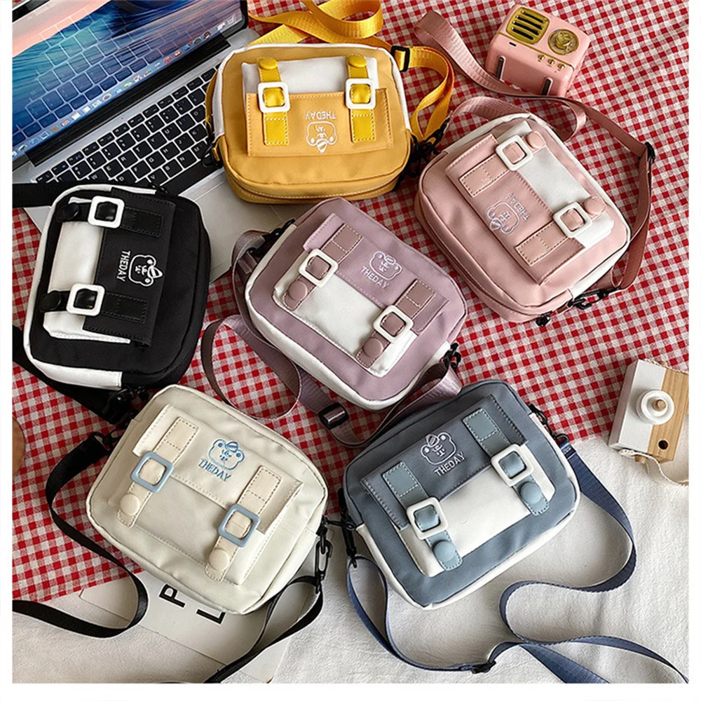 Korean Style Nylon Bag Female Japanese Solid Color Small Fresh Cartoon Print One-Shoulder Messenger Small Square Bag For Girls
Korean Style Nylon Bag Female Japanese Solid Color Small Fresh Cartoon Print One-Shoulder Messenger Small Square Bag For Girls