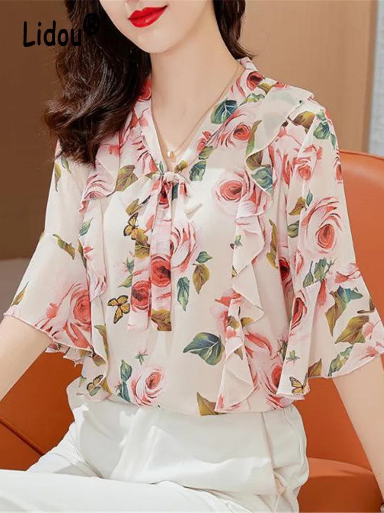 Женская блузка с коротким рукавом, Элегантная Модная винтажная блузка свободного покроя с цветочным принтом, оборками и бантом, милая униве... 
Женская блузка с коротким рукавом, Элегантная Модная винтажная блузка свободного покроя с цветочным принтом, оборками и бантом, милая униве...
