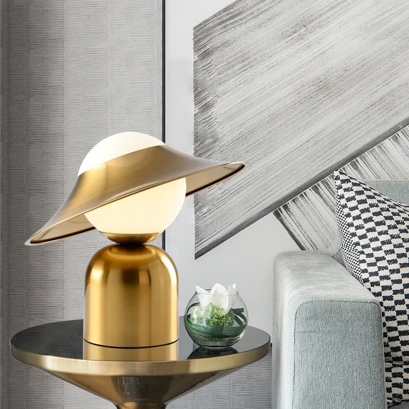 Modern simple table lamp creative metal hat designer model room living room bedroom bedside art table lamp
Modern simple table lamp creative metal hat designer model room living room bedroom bedside art table lamp