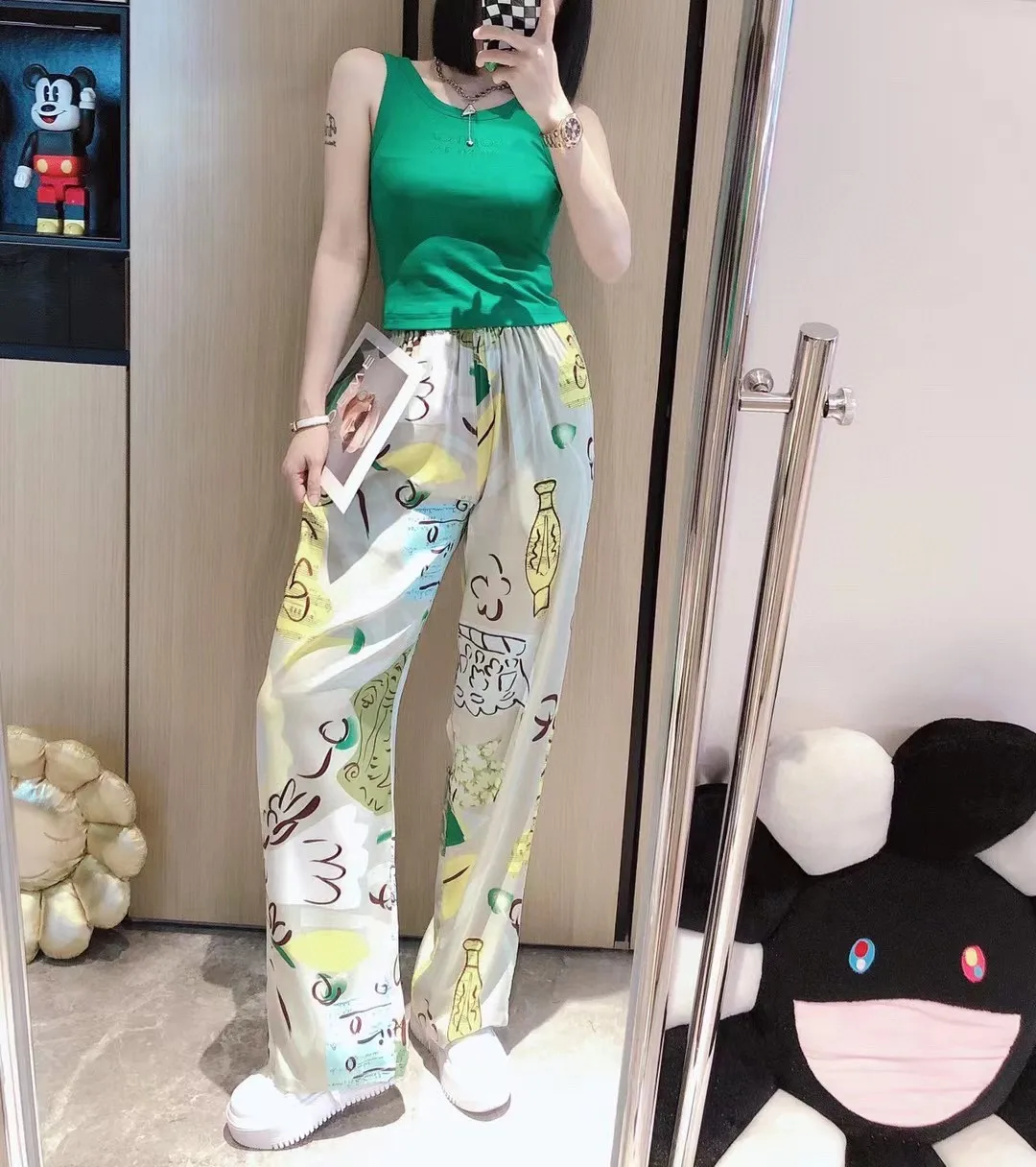 Женские брюки с широкими штанинами, повседневные брюки свободного покроя с принтом, 2022 
Женские брюки с широкими штанинами, повседневные брюки свободного покроя с принтом, 2022