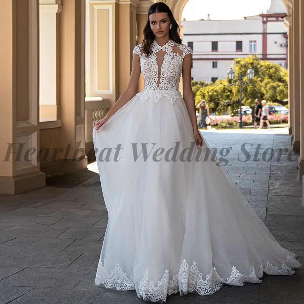 2023 Exquisite Jewel Wedding Dress with Short Sleeve Button Back A-Line Court Train and Applique Sequins for Ladies Bridal Gowns
2023 Exquisite Jewel Wedding Dress with Short Sleeve Button Back A-Line Court Train and Applique Sequins for Ladies Bridal Gowns