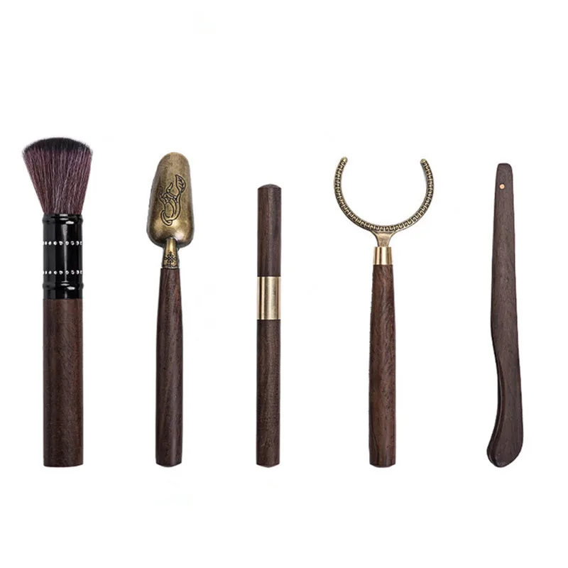 Ebony bamboo five-piece set Tea ceremony accessories alloy tea knife Cup holder tea needle tea spoon tea clip
Ebony bamboo five-piece set Tea ceremony accessories alloy tea knife Cup holder tea needle tea spoon tea clip