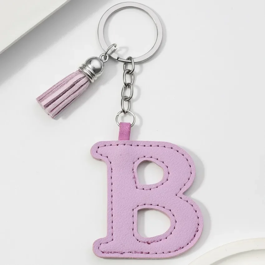 Брелок из нержавеющей стали с кисточками 
Брелок из нержавеющей стали с кисточками