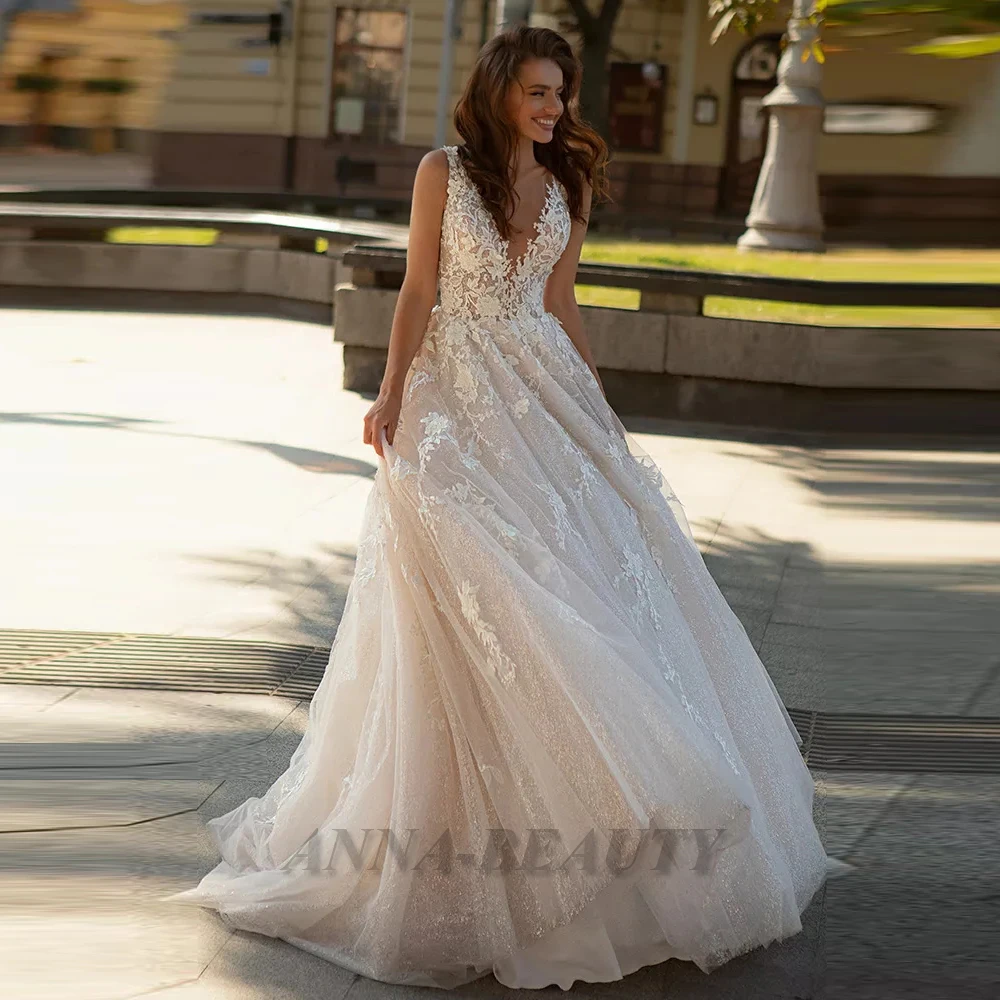 Anna Wedding Dresses For Bride Tank Appliques V Neck Sleeveless Court Train Sparkly Tulle A Line Backless Button Custom Made
Anna Wedding Dresses For Bride Tank Appliques V Neck Sleeveless Court Train Sparkly Tulle A Line Backless Button Custom Made