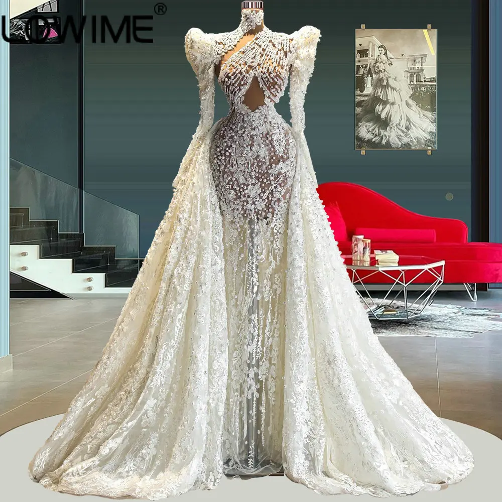 Turkey High Neck Overskirt Wedding Dresses Luxury Long Sleeves Princess Event Party Dress Dubai Pearls Boho Bridal Gowns
Turkey High Neck Overskirt Wedding Dresses Luxury Long Sleeves Princess Event Party Dress Dubai Pearls Boho Bridal Gowns
