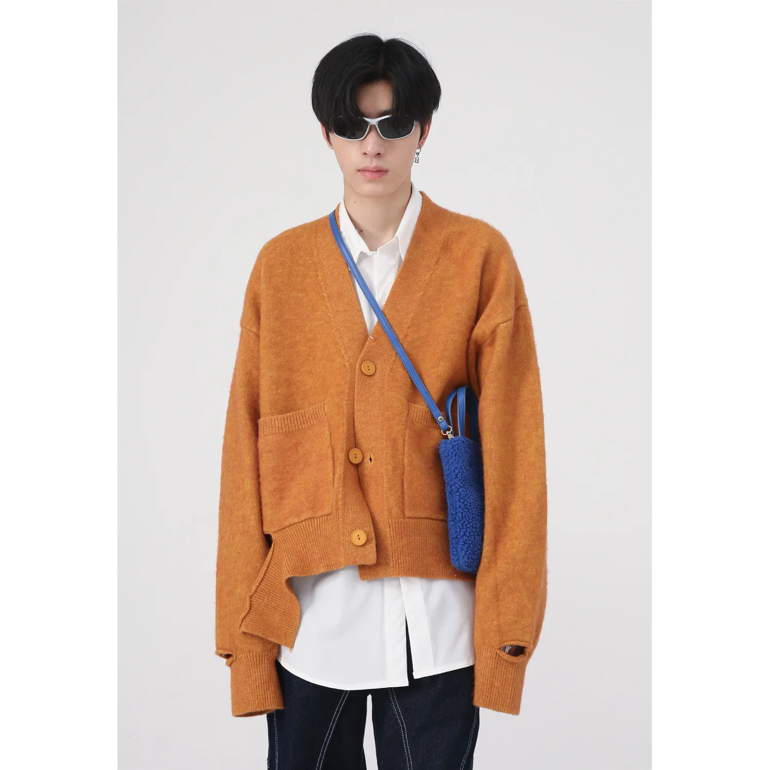 Oversized Ripped Knitted Cardigan Sweaters Men's Korean Fashion Solid Loose V-neck Sweater
Oversized Ripped Knitted Cardigan Sweaters Men's Korean Fashion Solid Loose V-neck Sweater