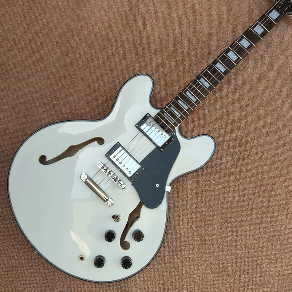 White Jazz Hollow Body Electric Guitar, Black Binder, Rosewood Fingerboard, Double F Holes, Free Shipping
White Jazz Hollow Body Electric Guitar, Black Binder, Rosewood Fingerboard, Double F Holes, Free Shipping