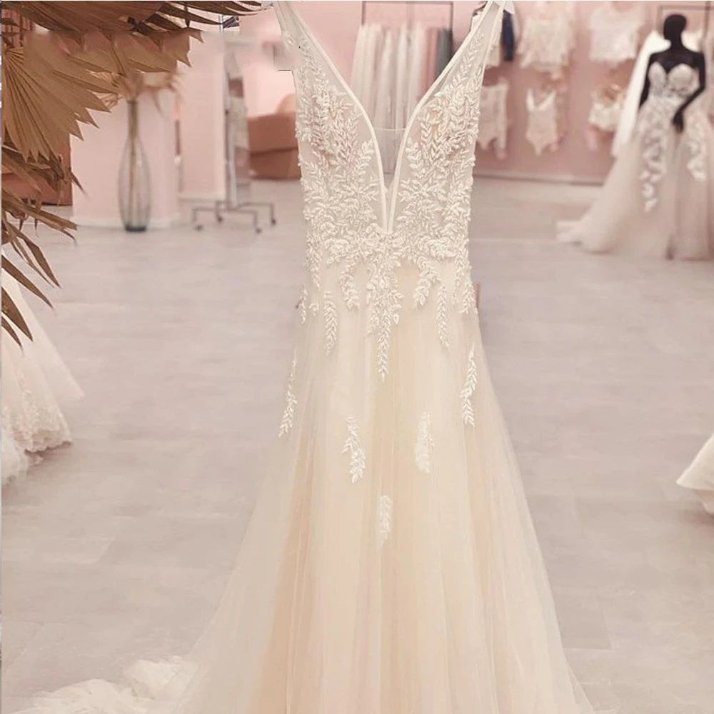 Exquisite Wedding Dress For Women V-Neck Backless Sleeveless Bride Dress Lace Applique A-Line Sweep Train Robe De Mariée
Exquisite Wedding Dress For Women V-Neck Backless Sleeveless Bride Dress Lace Applique A-Line Sweep Train Robe De Mariée