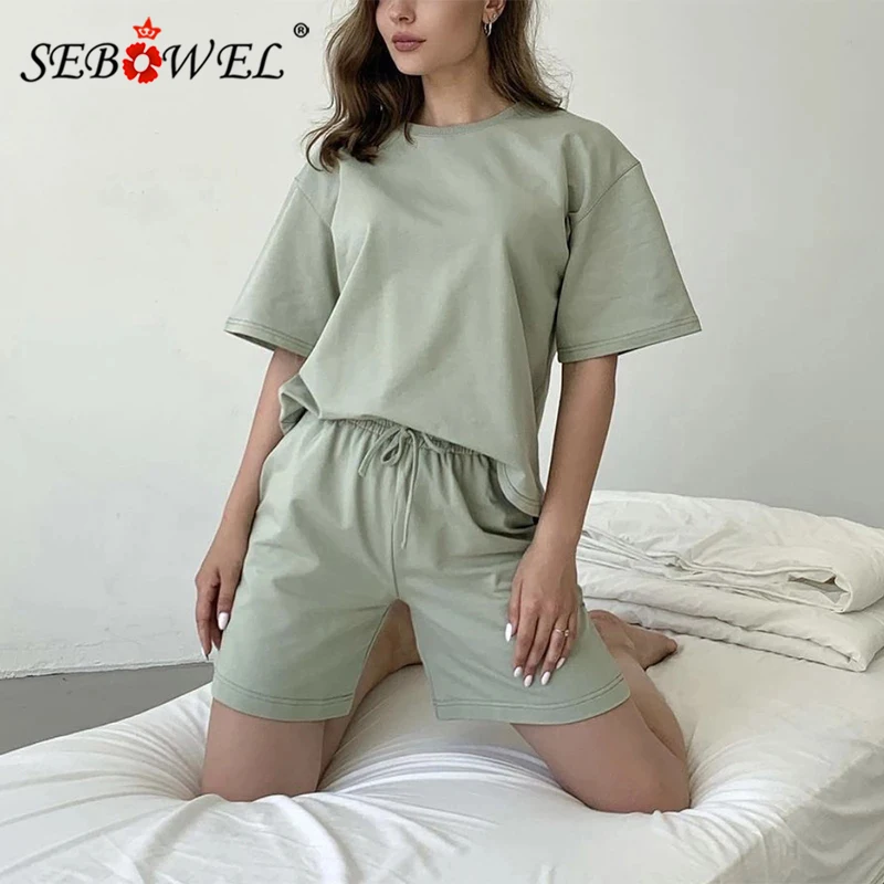 Женские летние комплекты из 100% хлопка SEBOWEL, новинка 2022, повседневные свободные костюмы из двух предметов, шорты с высокой талией
Женские летние комплекты из 100% хлопка SEBOWEL, новинка 2022, повседневные свободные костюмы из двух предметов, шорты с высокой талией