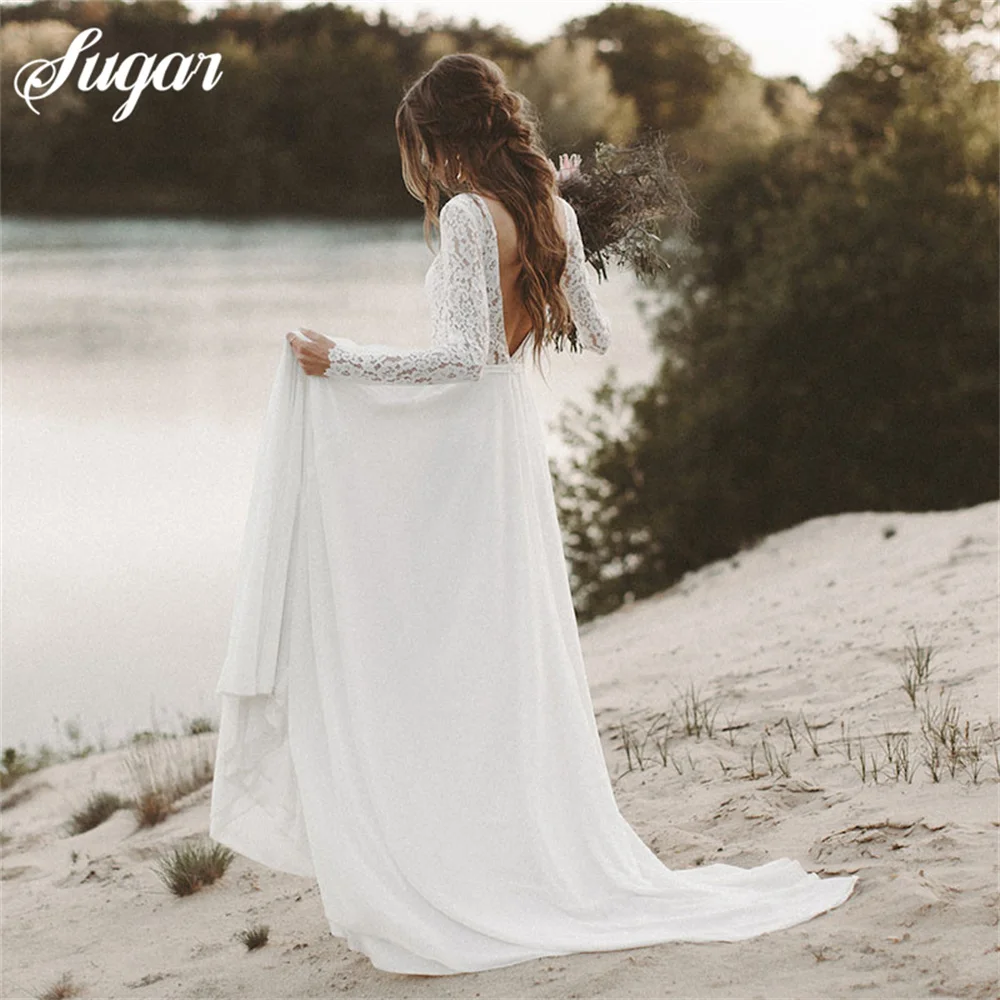 Beach Wedding Dresses Full Sleeve V-Neck Open Back Boho Bridal Gowns Chiffon Princess Party Dresses Sweep Train robe de mariée
Beach Wedding Dresses Full Sleeve V-Neck Open Back Boho Bridal Gowns Chiffon Princess Party Dresses Sweep Train robe de mariée