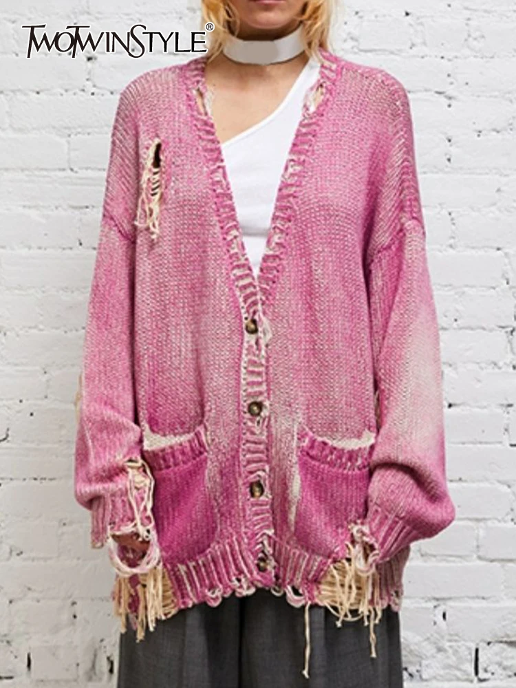TWOTWINSTYLE Loose Hollow Out Knitting Sweater For Women V Neck Long Sleeve Single Breasted Spliced Raw Hem Sweaters Female 2023
TWOTWINSTYLE Loose Hollow Out Knitting Sweater For Women V Neck Long Sleeve Single Breasted Spliced Raw Hem Sweaters Female 2023