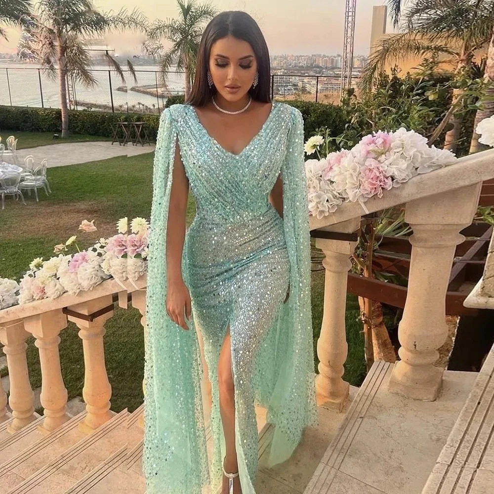 

Arabic Dubai Ice Blue Sequined Prom Party Dress with Cape V Neck Beaded Front Split Women Evening Pageant Gowns Robe De Soiree